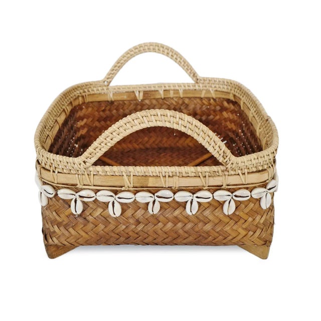 Beautiful vintage charming hand woven bamboo, rattan, and cowry shell basket. Each is slightly unique and sold individually.