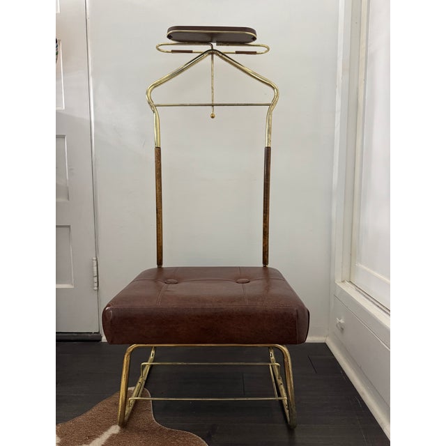 The sleek style of this valet chair can be paired with many different stylings- minor imperfection on ORIGINAL SEATING...