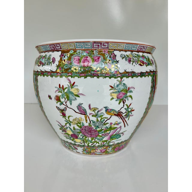 Vintage Famille Rose jardiniere. A Chinese, ceramic decorative fishbowl form, circa 1940-1950's. Bright pink, aqua and...