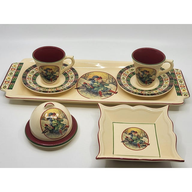 Elevate your festive table or winter décor with this magnificent complete dinnerware set in fine French earthenware, from...
