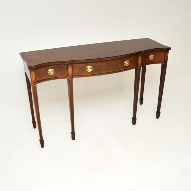 An outstanding antique Georgian style console table, made in England and dating from around the 1950’s. This is of...