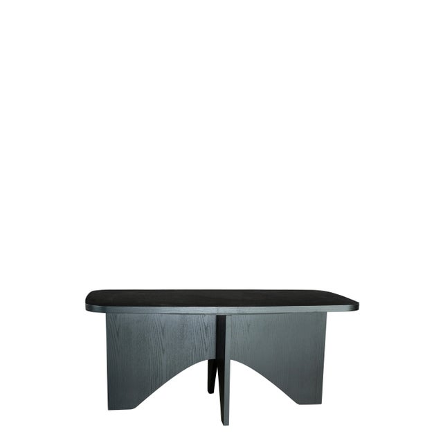 Sophisticated materials take a cue from modern geometry to create this spectacular dining table. Black color wood base...