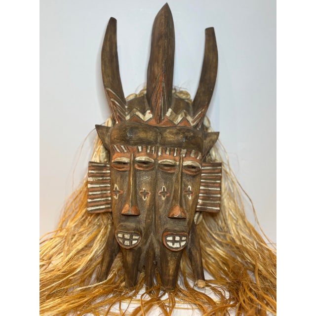 Late 19th Century West African Double-Faced Carved Wood Mask With Raffia and Cowrie Shells For Sale - Image 10 of 11