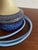 This handcrafted stoneware table lamp captivates with its shimmering, elegant blue glaze. In very good condition, it bears...