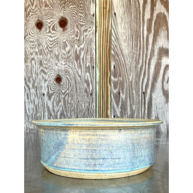Celebrate the beauty of handcrafted design with this stunning vintage studio pottery bowl. A truly one-of-a-kind piece, it...