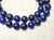 The necklace is 17.5 inches (44.5 cm) long, and the smooth round beads are 12 mm in size. The lapis lazuli beads are dark...