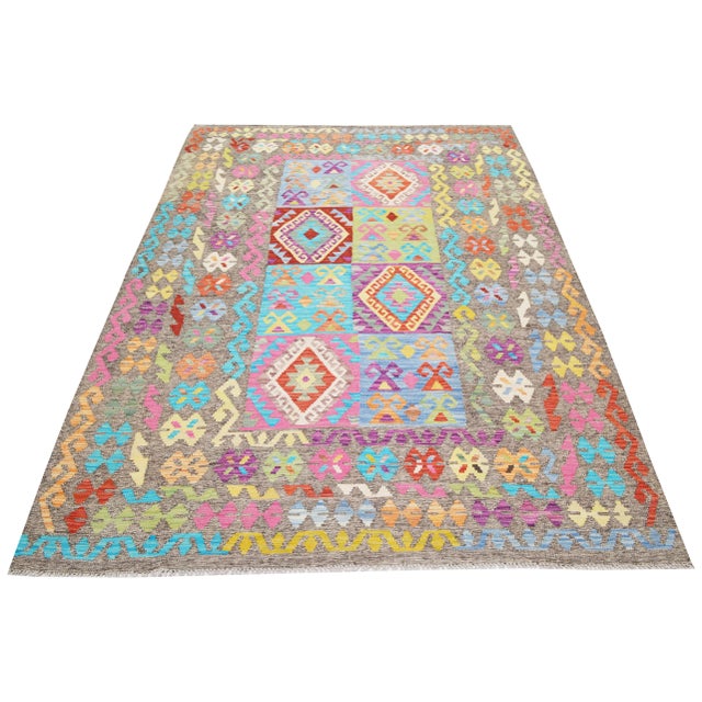 Afghan Maimana flatweave fine wool kilim with natural colors and geometric pattern.