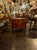 The 19th c. German Biedermeier Mahogany Commode is an antique piece of furniture that exudes elegance and craftsmanship....