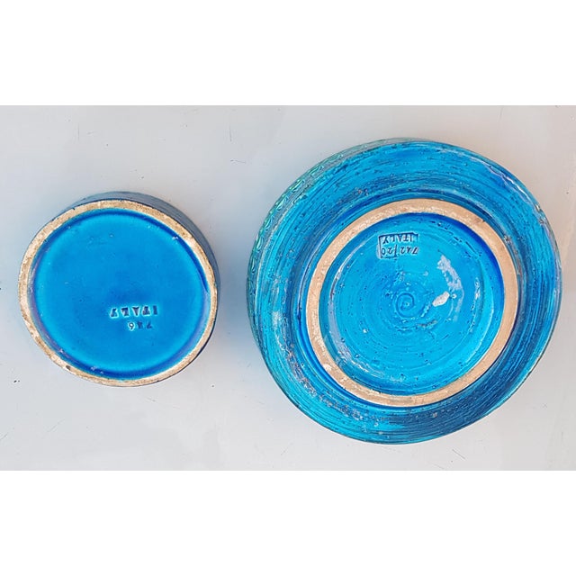 Italian Rimini Blue Flat Bowl and Ashtray by Aldo Londi for Bitossi, 1960s, Set of 2, in Good conditions. Designed 1960 to...