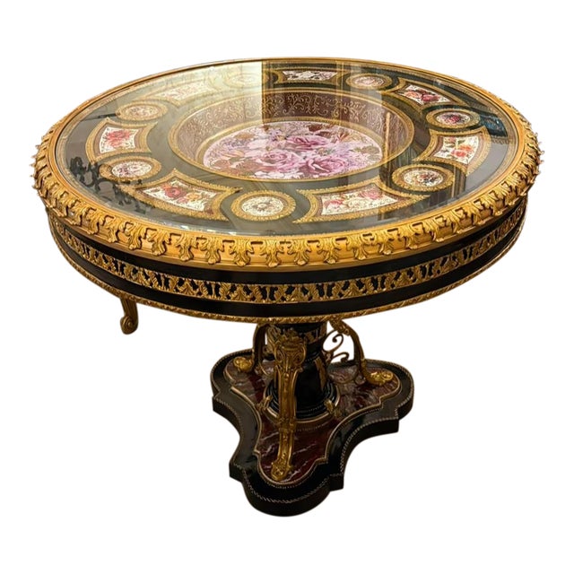 Grand French-Inspired Round Dining Table – Black Pedestal Base, Floral Decorative Inlay & Ornate Gold Leaf Details For Sale