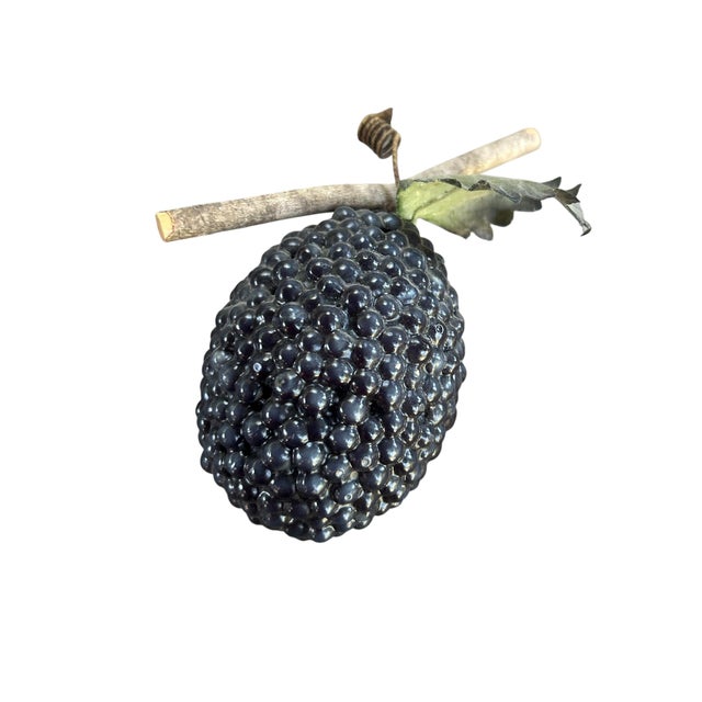 Set of 7 pieces of decorative fruit. All pieces are beaded, I believe in a resin material with decorative wooden sticks...