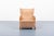 Modern Scandinavian Lounge armchair from 1950s with lacquered wood armrests and legs, upholstered in caramel galon....