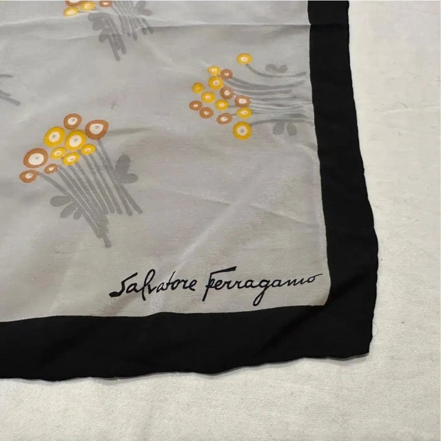 This is a stunning and rare vintage Salvatore Ferragamo silk carré scarf, a true collector's item likely dating from the...