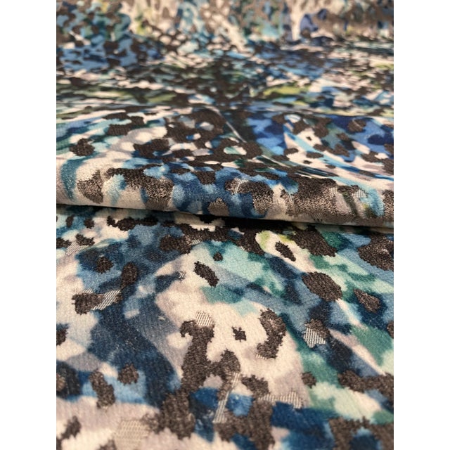 This beautiful cut velvet fabric has a blue, green, black, grey and ivory cameo design. The hand is soft and luxurious....