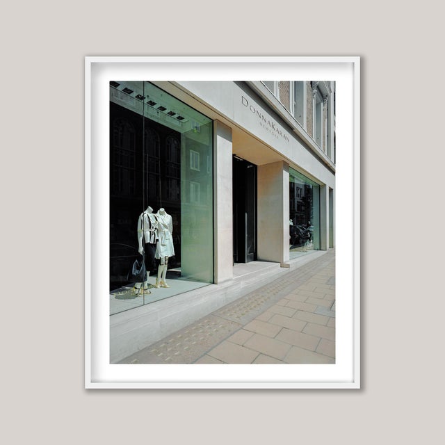 A striking and minimalist architectural photograph of the Donna Karan fashion store on New Bond Street, London. Taken in...