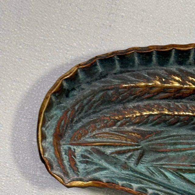 Turning the past into stunning décor for today — this 1948 solid brass tray from Virginia Metalcrafters is a striking...