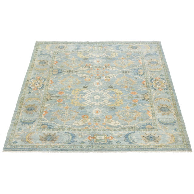 Elevate your living space with the timeless elegance of our Modern Sultanabad Wool Rug. Inspired by the iconic 19th-...