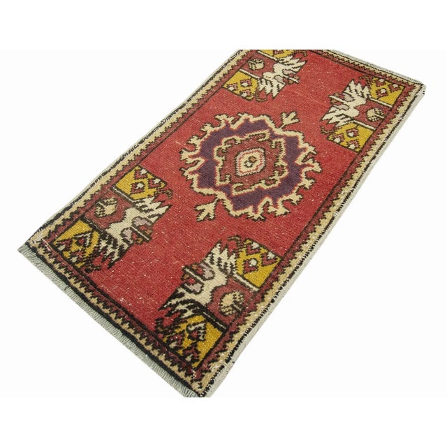 Vintage Handknotted decorative mini rug from Konya region of Turkey. Approximately 45-55 years old. In very good condition.