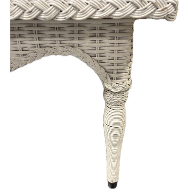 Perfect beach cottage c.1970 wicker coffee table in a nice substantial size. Creamy painted wicker with ornate weaving...