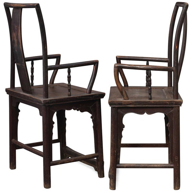 This handsome pair of chairs are from Shanxi province in central China, made from elm wood. They have unusual features...