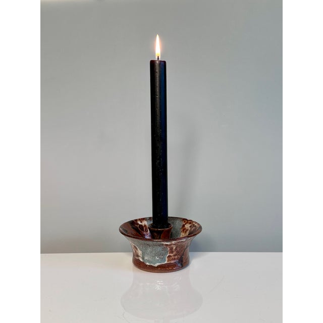 A rare piece of Danish craftsmanship from the late 1970s. This impressive candlestick by Jim and Henny Waldorff combines...