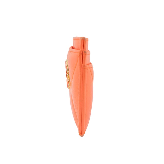 Brand: Chanel Gender: Ladies Measurements: (W x H x D): 0.50" x 3.10" x 4.50" Total Weight: 50.00 grams Chanel coco orange...