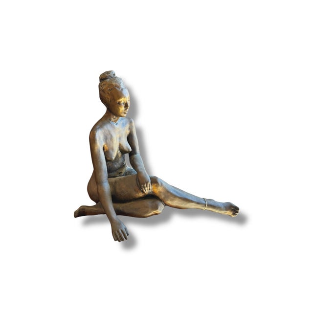 This striking nude female figure by Sharon Anderson is a beautifully expressive work of art, cast in warm brass with a...