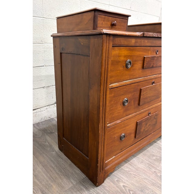 This is a stunning antique Victorian Eastlake wood gentleman's dresser or commode with marble inlay, Knapp joint drawers,...