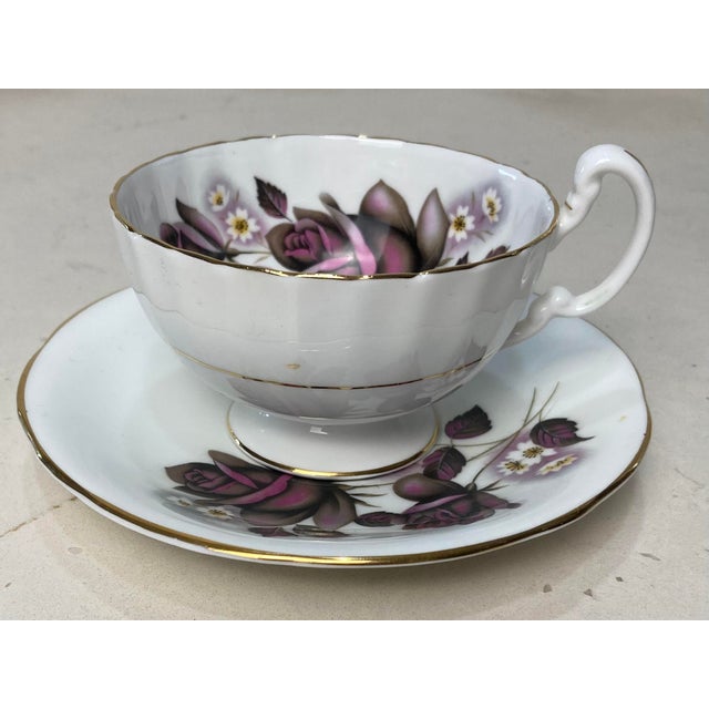 Great condition, there are no chips or cracks. Pink purple gray roses and leaves with a smaller white yellow accent...