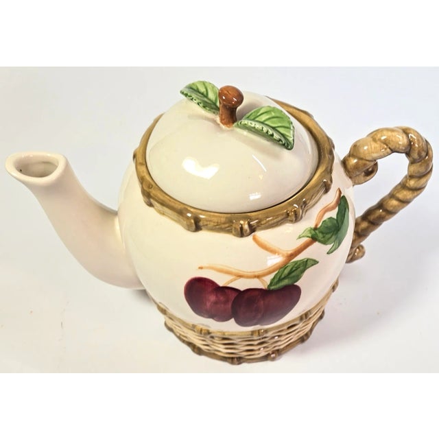 Listen, you don't know where it came from and it honestly doesn't matter. It's the most fabulous apple teapot in...