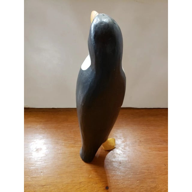 It measures 12 1/4" high, 3 1/4" wide and 3 1/2" deep. The piece is in very good overall condition with minor signs of...