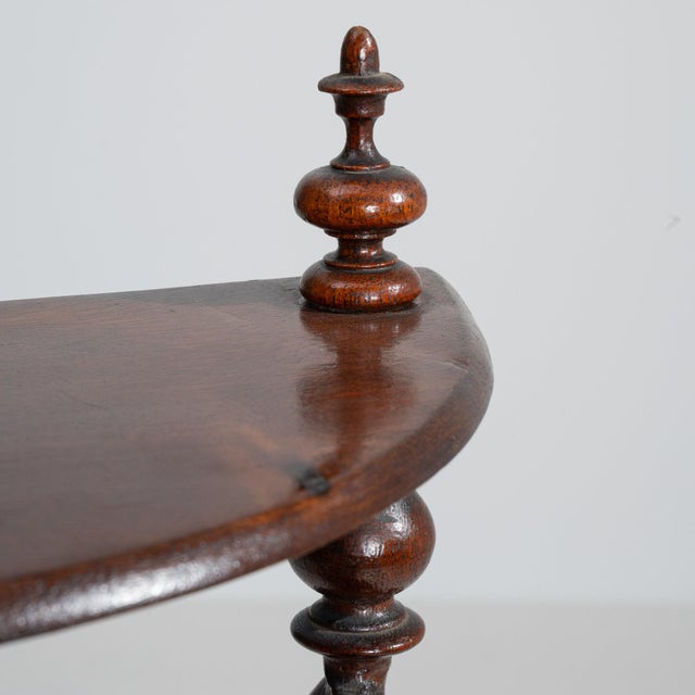 Four-tier turned walnut Ã©tagÃ¨re in Rich Walnut Brown. Finished in rich walnut brown, this four-tier turned walnut...