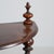 Four-tier turned walnut Ã©tagÃ¨re in Rich Walnut Brown. Finished in rich walnut brown, this four-tier turned walnut...