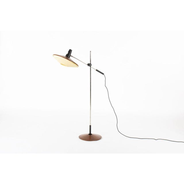 This floor lamp was designed by Georges Frydman and produced by Temde during the 1960s. It is a fine example of mid-...