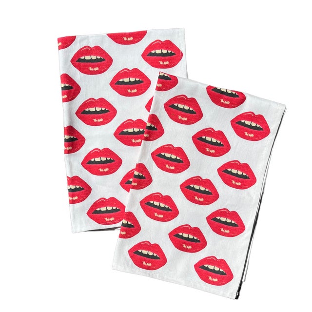 Our custom tea towels give a whole new meaning to "kiss the cook!" Set of two handmade towels are created in Mommani...
