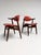 This typical vintage cowhorn chair is recognizable by its armrests shaped like a cowhorn. This distinctive wooden chair is...