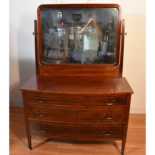 We are pleased to offer this beautiful set of Antique English Hepplewhite low dresser and high dresser with mirrors, from...
