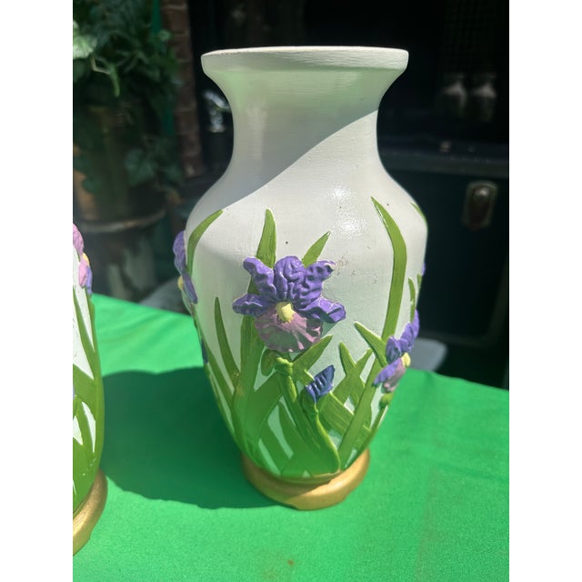 Up for consideration is a beautiful vintage pair of handmade floral ceramic vases. These would look lovely in your home,...