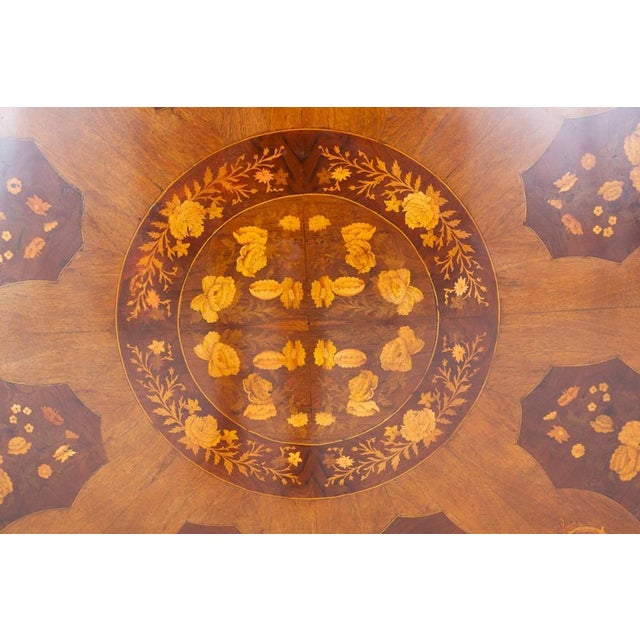 Of outstanding scale and decorative appeal, this impressive Victorian centre table is executed in richly figured walnut...