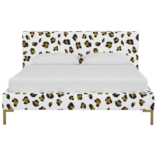 This low profile fully upholstered platform bed is a perfect piece for anyone looking to add a modern statement piece to...