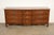 A beautiful French Provincial Louis XV style nine-drawer triple dresser or credenza By Baker Furniture USA, Circa 1980s...
