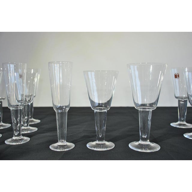 Beautiful set of Carlo Moretti's Murano glass glasses, late 90s. The set consists of: - 12 wine glasses - 19 x 9 cm - 12...