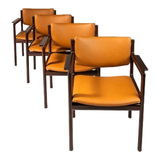 Set of 4 Danish Modern Arm Chairs in Solid Mahogany & Caramel Leather by Danish Overseas Imports, Circa 1960's For Sale