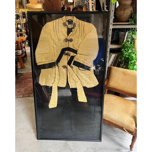 Up for consideration is a beautiful vintage Asian framed kimono art piece. This would look lovely in your home, and it is...
