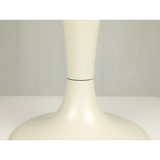 Very nice stool made of white-painted fiberglass/resin with olive green cushioned seat. Very good vintage condition.