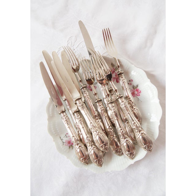 German dessert cutlery set by Solingen for 6 people, Louis XV style, from the second half of the 20th century. The handles...