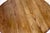 A round coffee table in oak with wonderful carving details on the legs of wolves or monsters or gargoyles. Made around the...