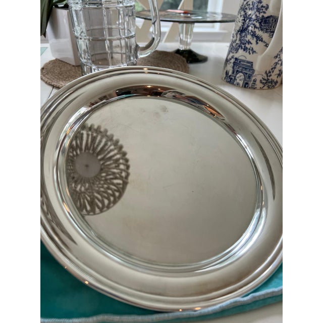 Crafted in 1992 by Tiffany & Co. specially for The Mirage, this elegant serving tray features a classic circular design...