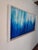 “Mood” (2020s) by RacquelJ is a striking contemporary abstract rendered in acrylic on plywood. Vertical drips of indigo,...