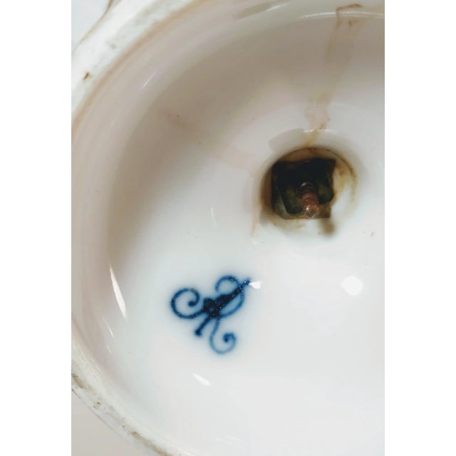 Exquisite matching pair of 19th-century Meissen porcelain Augustus Rex compotes. These stunning pieces feature intricate...